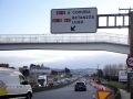 Cartel indicativo con los nombres de A Coruña y Betanzos