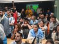 Hinchas argentinos viendo un partido en La Mila, en 2022