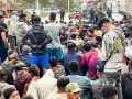 CEUTA, 18/09/2026.- Traslado de migrantes asentados en la playa de Benítez, este viernes. Las autoridades han iniciado a primera hora de este viernes el traslado de los migrantes asentados en las playas de Benítez y el Trampolín de Ceuta hasta el campamento temporal habilitado en el puerto de la ciudad, con capacidad para unas 1.700 personas. Un amplio dispositivo policial se ha desplegado en torno a las 7:15 de la mañana en ambos asentamientos, donde permanecen adultos y menores desde la entrada masiva registrada el pasado 30 de julio. EFE/Reduan