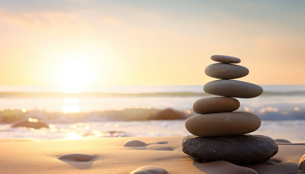Piedras zen equilibradas en la playa con espacio de copia luz del amanecer meditacion y relajacion ai generativo