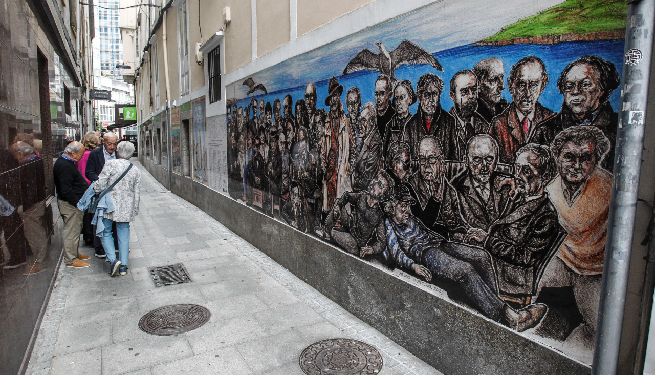 mural de la librería Arenas con escritores españoles en la calle arévalo.