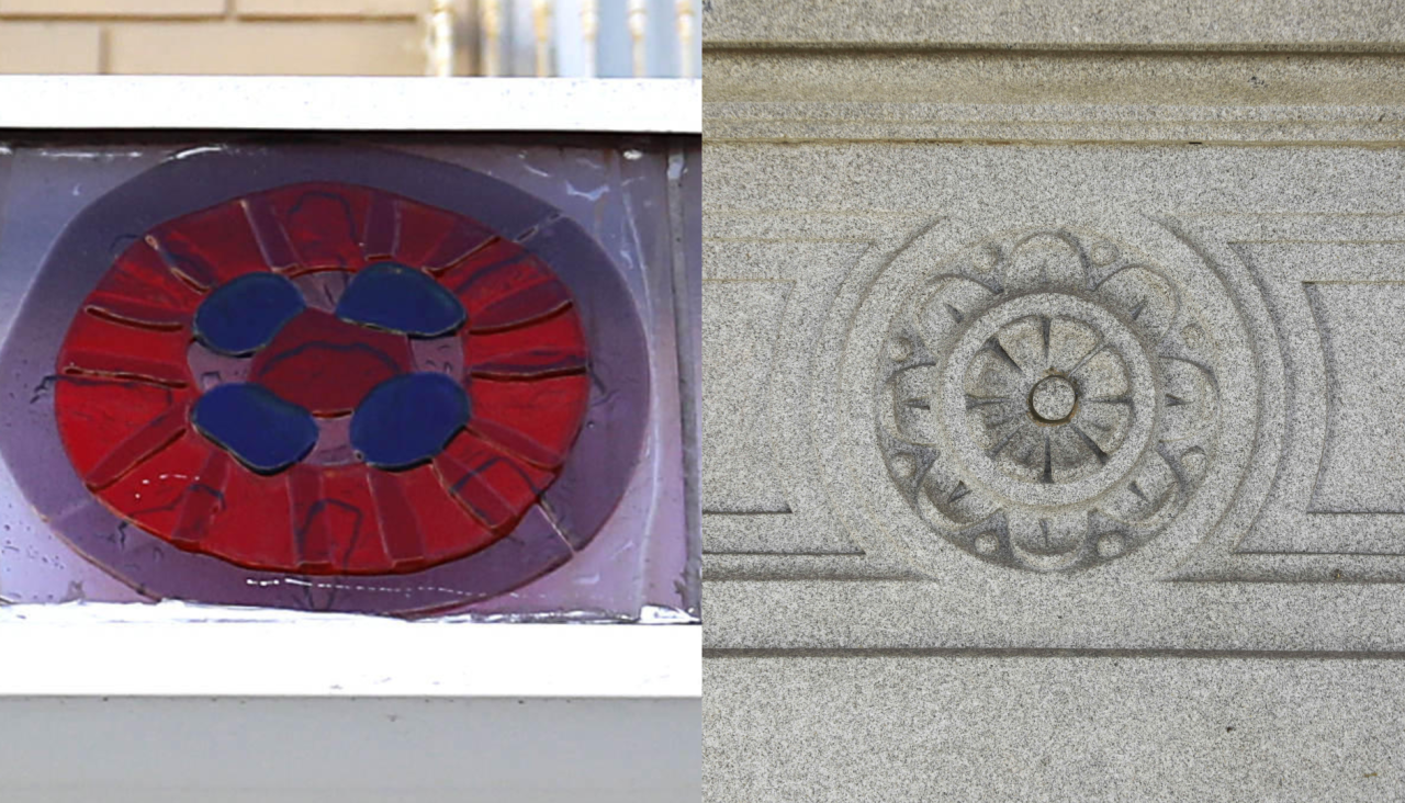 Rosetón en el número 14 y bajo una ventana del palacio municipal