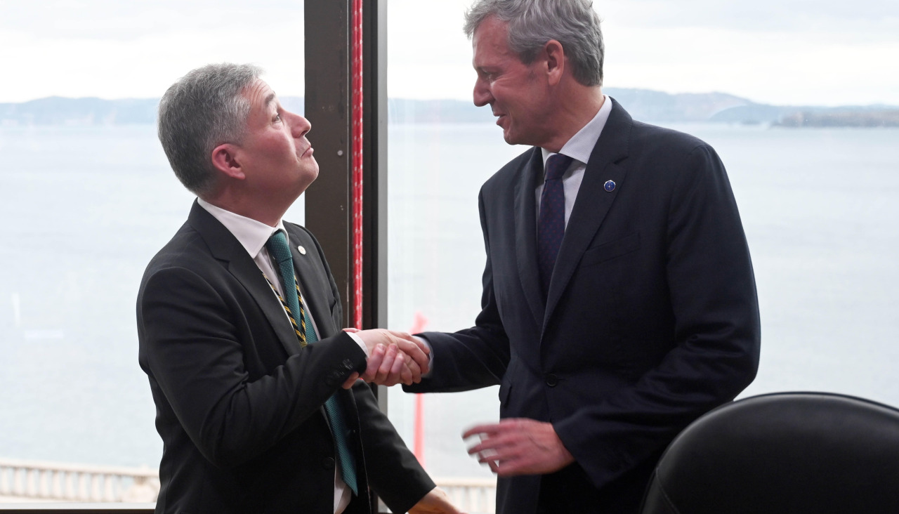 Ricardo Cao y Alfonso Rueda, en la toma de posesión como rector