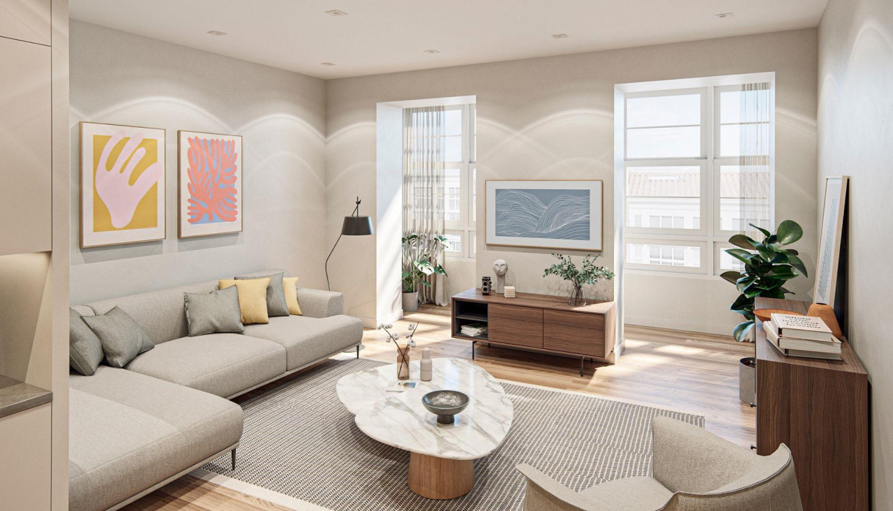 Vista de parte del salón de una de las viviendas turísticas, donde se puede ver la galería